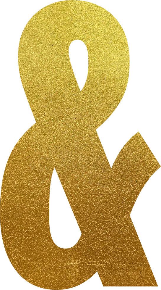Large, textured, gold-colored ampersand symbol.